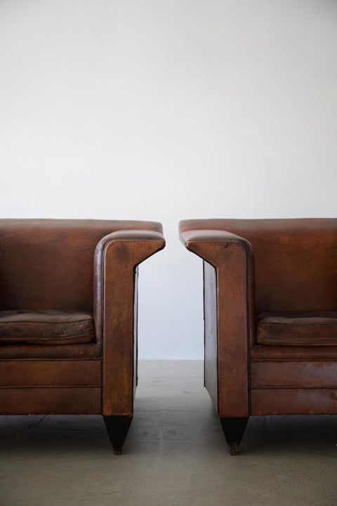 Pair of Fin Armed Sheepskin Leather Chairs