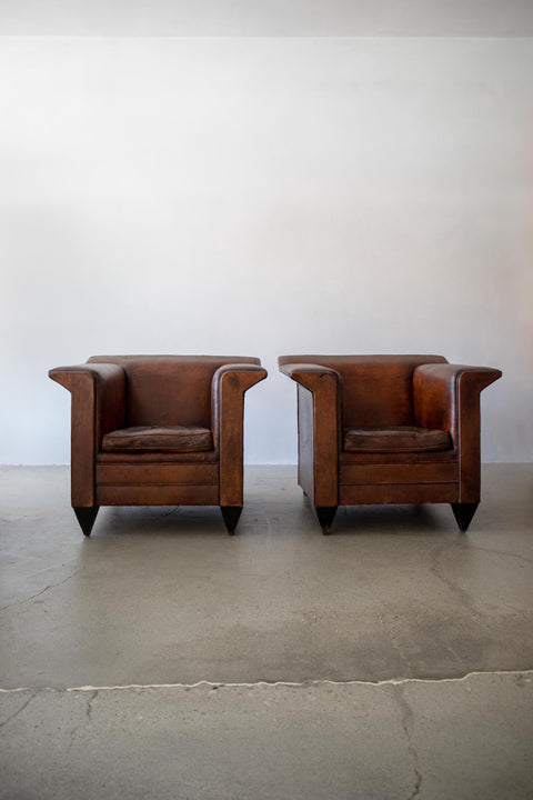 Pair of Fin Armed Sheepskin Leather Chairs