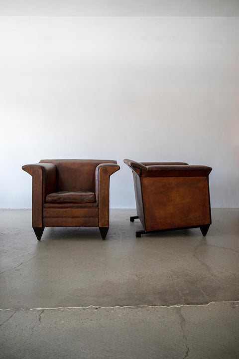 Pair of Fin Armed Sheepskin Leather Chairs